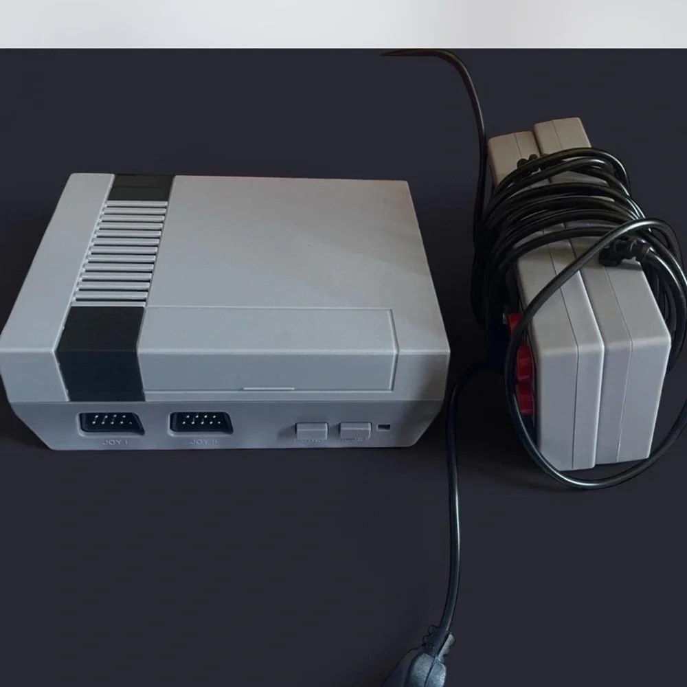 Nintendo gray mini console with wired controller